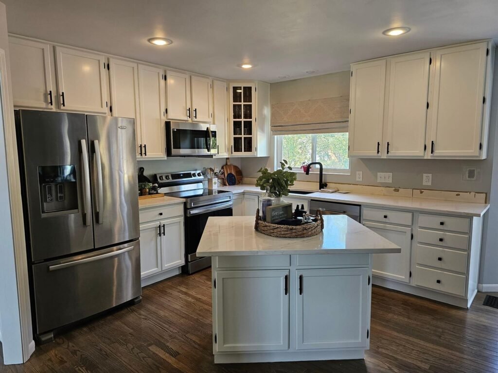 Kitchen cabinets refinished in a smooth white finish