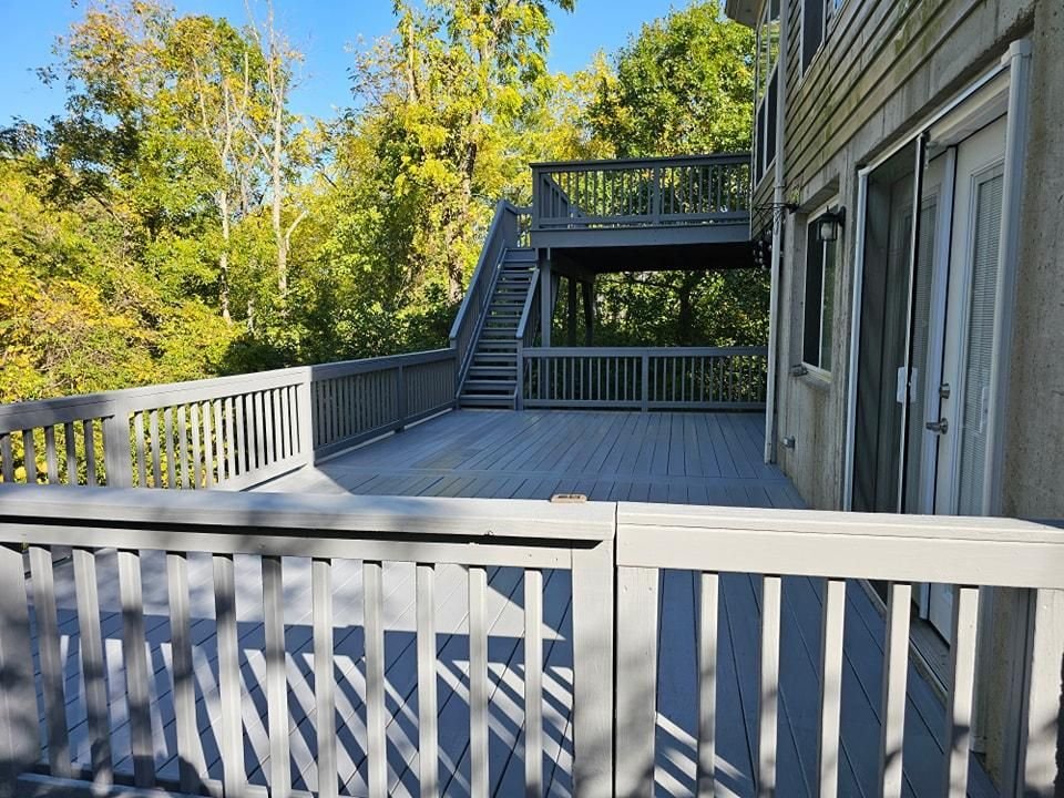 Two story deck and stairs after staining and wood restoration