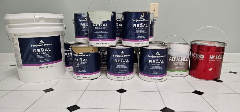 Quality paint and coatings staged on a Hearts & Hands job site