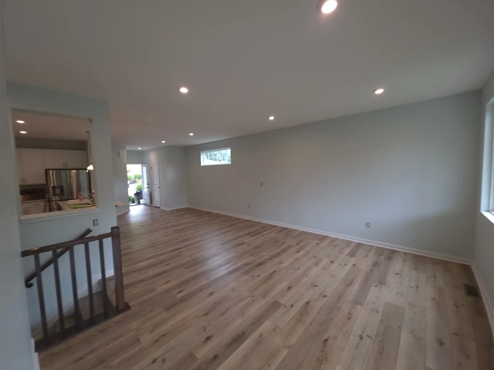 Home Completed interior in Alexandria, Kentucky, with light walls, white trim and wood-look flooring.