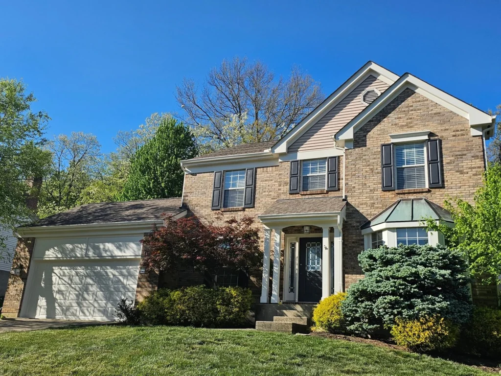 Brick home exterior with white trim. No city-specific project attribution.