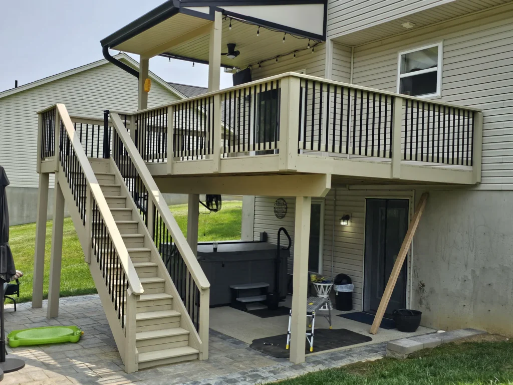 Light coated deck, stair stringers and dark balusters in Florence, Kentucky.